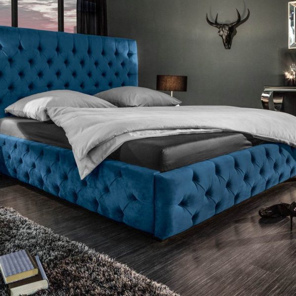 LuxD Dizajnová posteľ Laney 160x200 cm tmavomodrý zamat