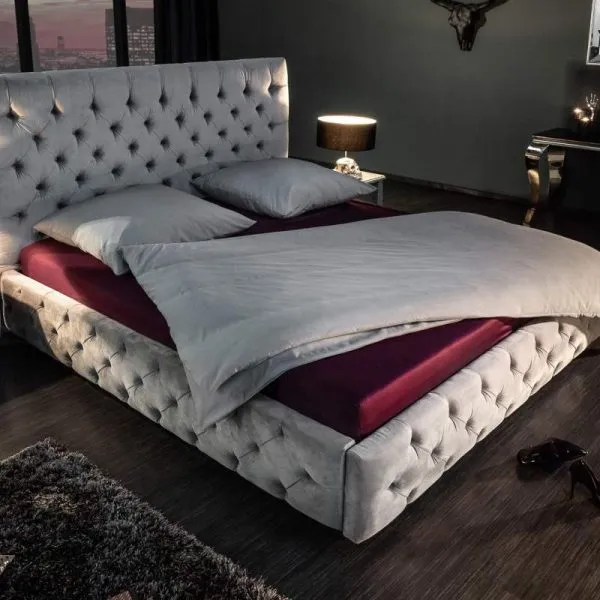 LuxD Dizajnová posteľ Laney 180x200 cm sivý zamat