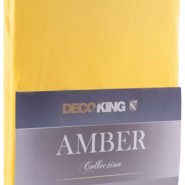 Bavlnené jersey prestieradlo s gumou DecoKing Amber žlté